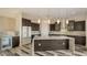 Spacious kitchen with island, modern cabinetry, and marble countertops at 1214 Gulf Blvd, Englewood, FL 34223