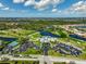 Community overview featuring golf course, clubhouse, and resort-style amenities at 1227 Tuscany Blvd, Venice, FL 34292