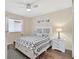 Bright bedroom with king-size bed and ample closet space at 1227 Tuscany Blvd, Venice, FL 34292