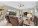 Relaxing living area with sliding doors opening to a pool view at 1227 Tuscany Blvd, Venice, FL 34292