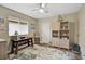 Home office with built-in shelving and wood desk at 1227 Tuscany Blvd, Venice, FL 34292