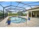 Relaxing pool area with covered patio and plenty of space for lounging at 1227 Tuscany Blvd, Venice, FL 34292