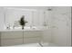 Elegant bathroom with double vanity, marble shower, and modern fixtures at 1305 4Th St # 401B, Sarasota, FL 34236