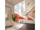 Bright entryway with modern staircase, artwork, and natural light at 1305 4Th St # 403B, Sarasota, FL 34236