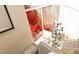 Open staircase with modern chandelier and city views at 1305 4Th St # 403B, Sarasota, FL 34236
