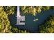 Aerial view of a dock with a kayak on the water, surrounded by mangrove trees at 1305 4Th St # 502B, Sarasota, FL 34236