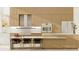 Modern kitchen with light wood cabinets and marble countertops at 1305 4Th St # 502B, Sarasota, FL 34236
