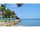 Scenic waterfront view with palm trees and a peaceful atmosphere at 1305 4Th St # 502B, Sarasota, FL 34236