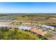 Aerial view of the property and surrounding neighborhood at 14369 Eagle Branch Dr, Nokomis, FL 34275