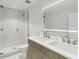 Modern bathroom with double vanity and glass shower at 1558 4Th St # 402, Sarasota, FL 34236