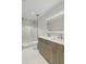 Modern bathroom with double vanity and glass shower at 1558 4Th St # 402, Sarasota, FL 34236