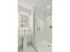 Modern bathroom with a frameless glass shower and LED mirror at 1558 4Th St # 402, Sarasota, FL 34236