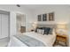 Bedroom with a queen bed and ensuite bathroom at 1558 4Th St # 402, Sarasota, FL 34236