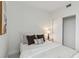 Bright bedroom with a queen bed, and large closet at 1558 4Th St # 402, Sarasota, FL 34236