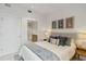 Bedroom with a queen bed and ensuite bathroom at 1558 4Th St # 402, Sarasota, FL 34236