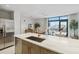 Open concept kitchen with island and city views at 1558 4Th St # 402, Sarasota, FL 34236