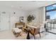 Bright living room features a comfy sofa and stylish arm chair at 1558 4Th St # 402, Sarasota, FL 34236