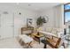 Modern living room with light colored sofa and wooden accents at 1558 4Th St # 402, Sarasota, FL 34236