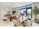 Open concept living and dining area with city views at 1558 4Th St # 402, Sarasota, FL 34236
