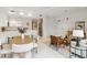 Open concept living, dining, and kitchen area at 1558 4Th St # 402, Sarasota, FL 34236