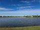Community boasts a tranquil lakefront setting with numerous homes at 18059 Cherished Loop, Bradenton, FL 34211