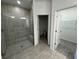 Bathroom features a large shower, a toilet, and a walk-in closet at 18059 Cherished Loop, Bradenton, FL 34211