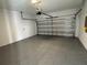 Spacious garage with epoxy flooring and automatic door opener at 18059 Cherished Loop, Bradenton, FL 34211