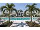 Relax by the refreshing community pool with lounge chairs at 18059 Cherished Loop, Bradenton, FL 34211