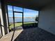 Relaxing screened porch overlooking a lake with beautiful water views at 18059 Cherished Loop, Bradenton, FL 34211