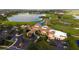 Resort-style community clubhouse with pool, tennis courts, and golf course views at 206 Bella Vista Ter # 29B, North Venice, FL 34275