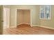 Bedroom with corner closet and access to bathroom at 206 Bella Vista Ter # 29B, North Venice, FL 34275