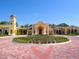 Grand community clubhouse entrance at 206 Bella Vista Ter # 29B, North Venice, FL 34275