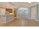 Open dining area with tile floors and recessed lighting at 206 Bella Vista Ter # 29B, North Venice, FL 34275