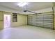 Garage with door open, showing interior access at 206 Bella Vista Ter # 29B, North Venice, FL 34275