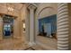 Elegant lobby with twisted columns and reception area at 206 Bella Vista Ter # 29B, North Venice, FL 34275