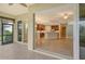 Spacious patio with view of the kitchen at 206 Bella Vista Ter # 29B, North Venice, FL 34275