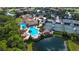 Resort-style pool with surrounding lounge area and lush landscaping at 206 Bella Vista Ter # 29B, North Venice, FL 34275