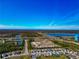 Expansive aerial view showcasing the community's proximity to highways, lakes, and various amenities at 2164 Midnight Pearl Dr, Sarasota, FL 34240
