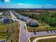 A scenic property surrounded by lush greenery, ponds, and meticulously maintained homes, creating a desirable neighborhood at 2164 Midnight Pearl Dr, Sarasota, FL 34240
