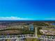Expansive aerial view showcasing the community's proximity to highways, lakes, and various amenities at 2164 Midnight Pearl Dr, Sarasota, FL 34240