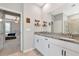 Bathroom with double sinks, tile flooring, and walk in shower at 2164 Midnight Pearl Dr, Sarasota, FL 34240