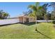 Spacious backyard with grassy lawn at 2200 Pratt Avenue, North Port, FL 34286