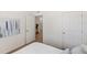 Well-lit bedroom with an ensuite bathroom at 2200 Pratt Avenue, North Port, FL 34286