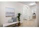 Open entryway with view of kitchen and extra doors at 2200 Pratt Avenue, North Port, FL 34286