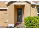 Inviting front entrance with landscaping at 2200 Pratt Avenue, North Port, FL 34286