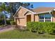 Charming house exterior with a two-car garage at 2200 Pratt Avenue, North Port, FL 34286