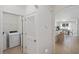 Convenient laundry room with washer, dryer, and additional storage at 2200 Pratt Avenue, North Port, FL 34286