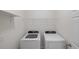 Bright laundry room with washer and dryer at 2200 Pratt Avenue, North Port, FL 34286