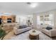 Bright and airy living room with a view to kitchen and dining area at 2200 Pratt Avenue, North Port, FL 34286