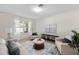 Cozy living room featuring neutral tones and comfortable seating at 2200 Pratt Avenue, North Port, FL 34286
